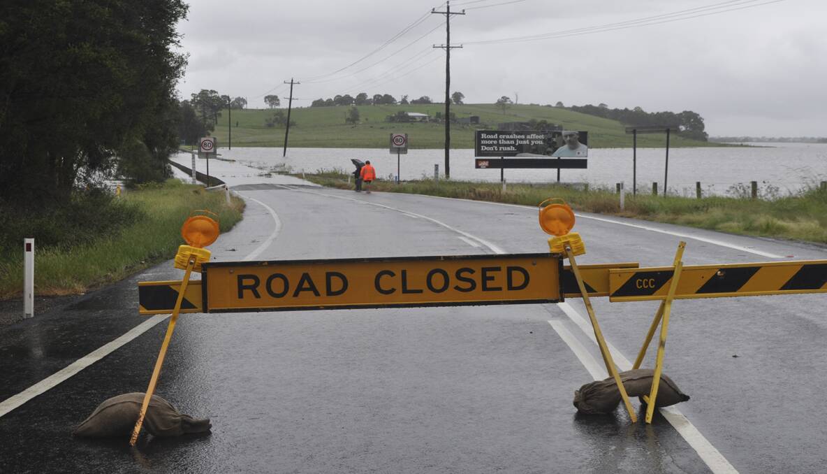 FLOODED: Cessnock Road at Testers Hollow on Saturday afternoon.