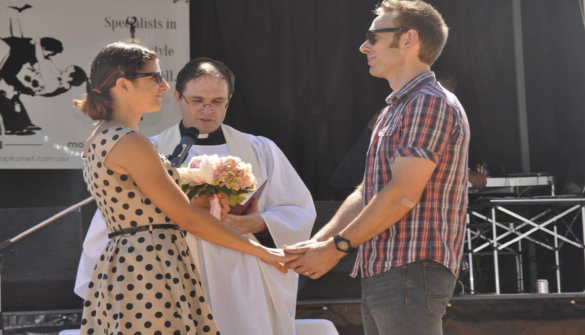Maria and Travis Lomas from Sydney renewed their wedding vows in the festival's shotgun wedding on Saturday. 