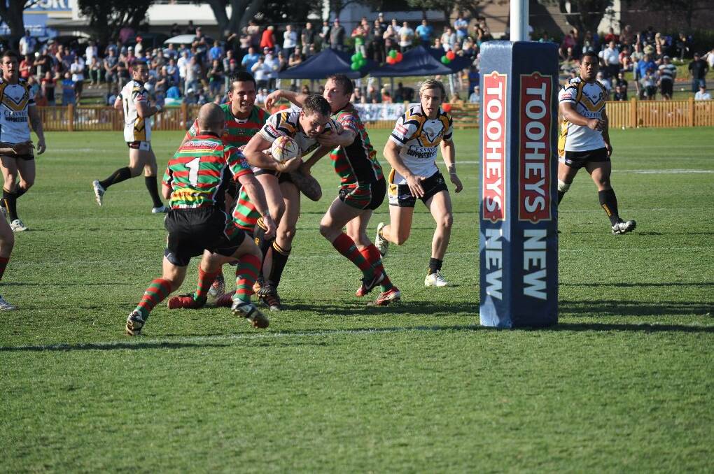 Second-half action from the Newcastle Rugby League grand final. Goannas lock Brendan Hlad makes a charge towards the tryline...