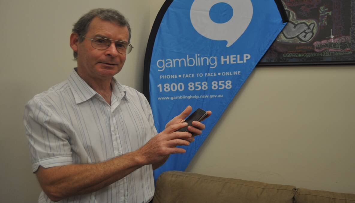 TAKE CONTROL:  Samarit­ans Gambling Help counsellor, Graeme Penney demonstrates the  Stay On Track app.
