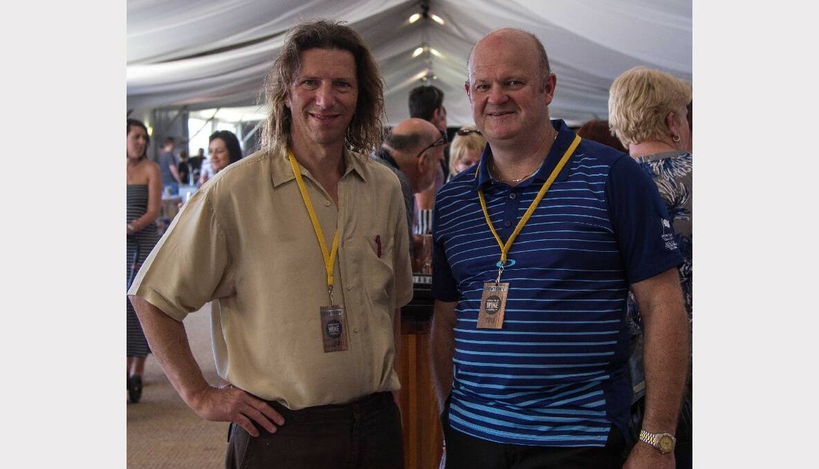 Dr Jerry Schwartz and David Bark, General Manager Crowne Plaza Hunter Valley, taking time out to enjoy the festivities in the Main Marquee of the Hunter Valley Wine Festival.