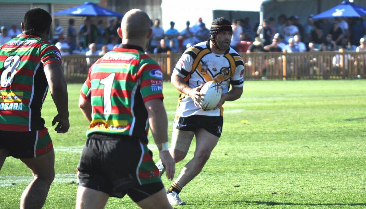 Second-half action from the Newcastle Rugby League grand final. Goannas forward Brendan Worth on the move.