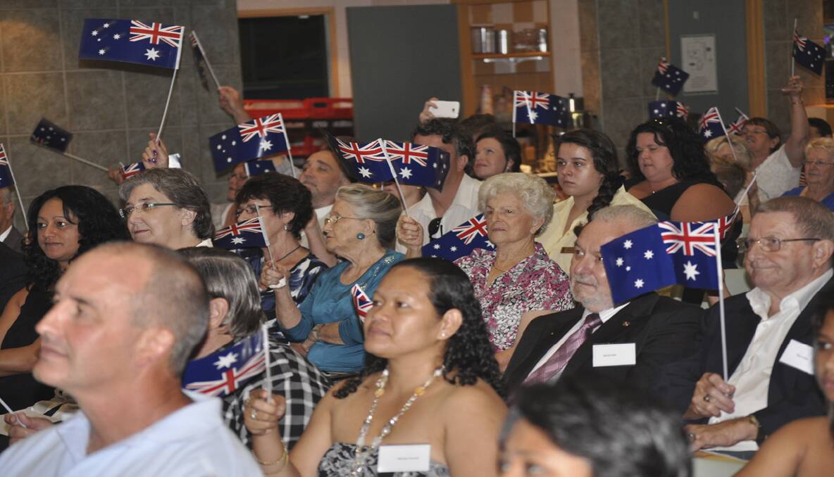 The crowd waves their flags and displays their pride at Cessnock’s Australia Day ceremony.